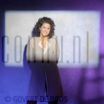 08-06-2004 Karin de Groot at studio in Amsterdam, by order of KRO. 

[keywords]Posed, Half Length, Smiling[/keywords]